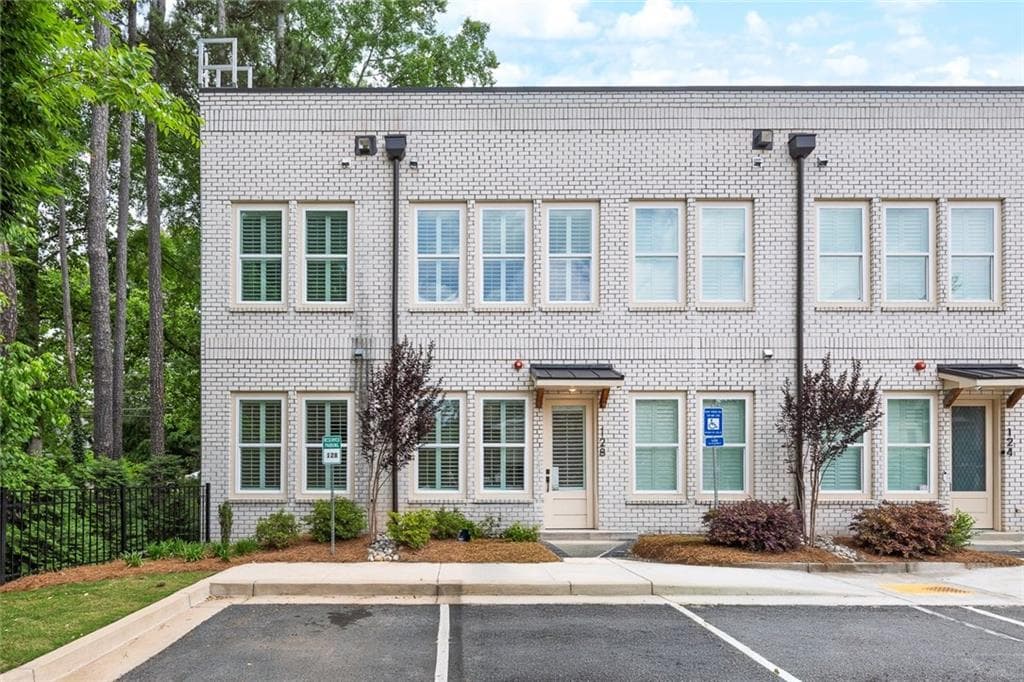 2 bedroom, 2 bathroom, 1,152 sq ft townhouse for sale at 9040 Main Street 128, Woodstock, GA 30188