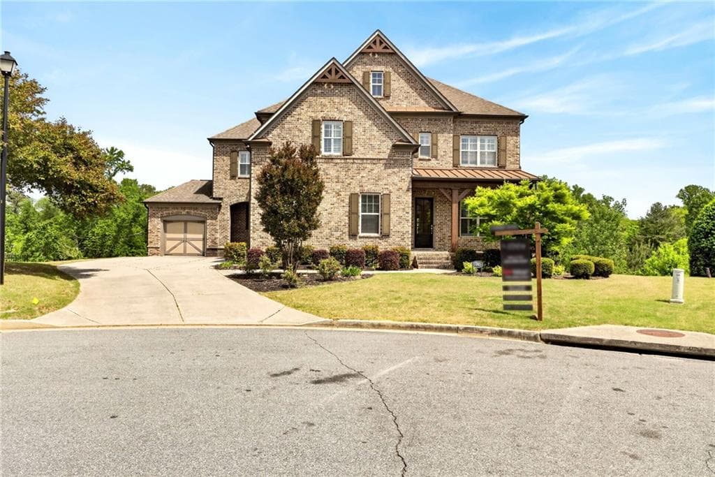 6 bedroom, 5 bathroom, 5,167 sq ft single family residence sold at 5945 Caveat Court, Suwanee, GA 30024