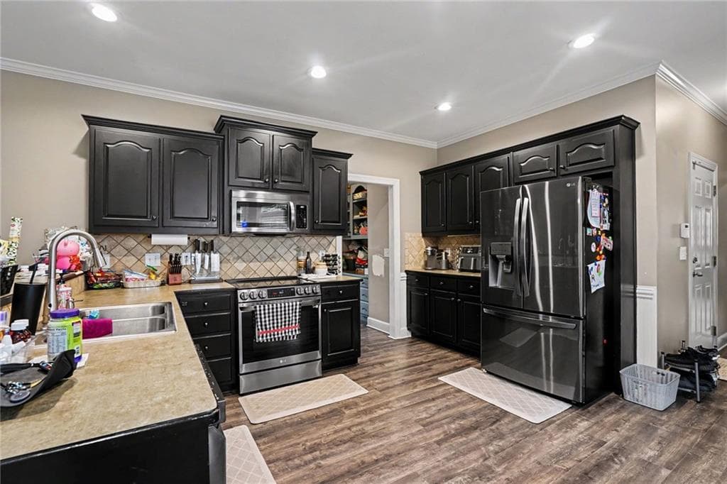 5 bedroom, 4 bathroom, 4,340 sq ft single family residence for sale at 521 Richmond Place, Loganville, GA 30052 — photo 8
