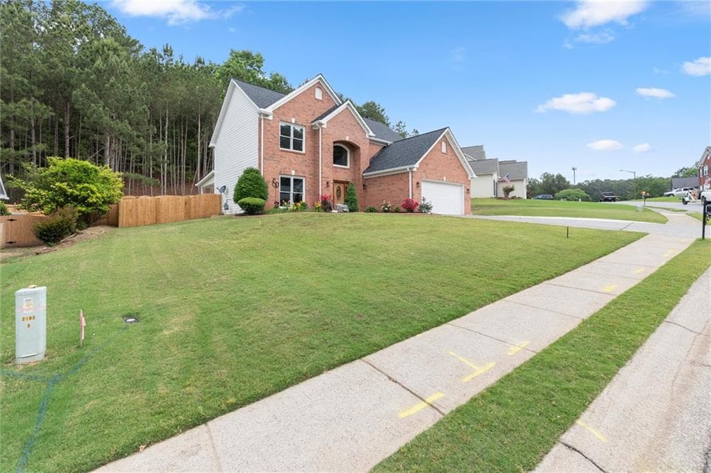 4 bedroom, 3 bathroom, 2,320 sq ft single family residence for sale at 1012 Blankets Creek Drive, Canton, GA 30114 — photo 4