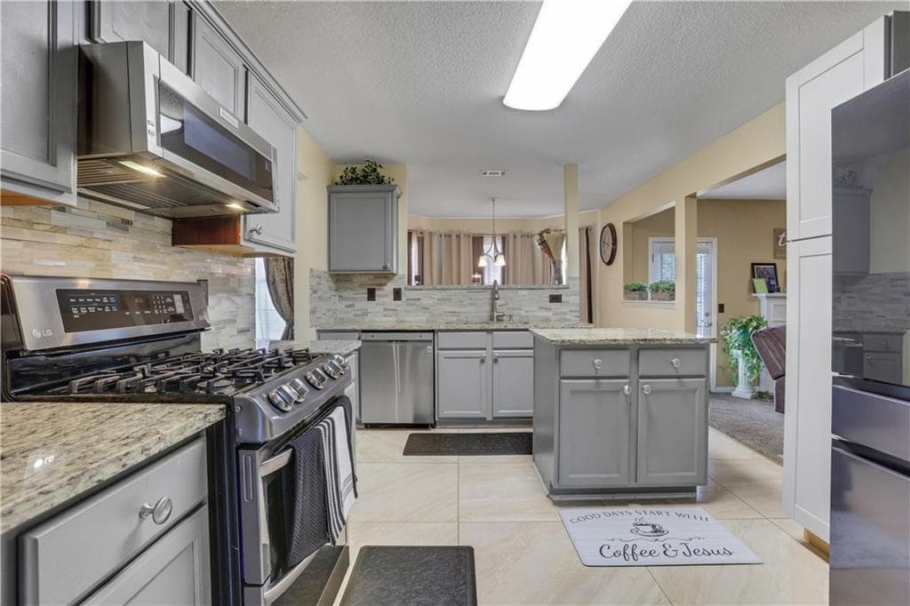 4 bedroom, 3 bathroom, 2,920 sq ft single family residence for sale at 5870 Sunflower Court, Ellenwood, GA 30294 — photo 2