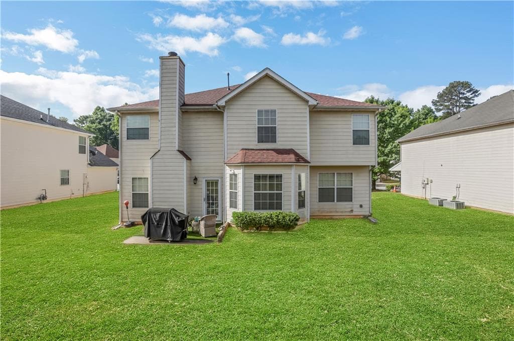 4 bedroom, 3 bathroom, 2,920 sq ft single family residence for sale at 5870 Sunflower Court, Ellenwood, GA 30294 — photo 6
