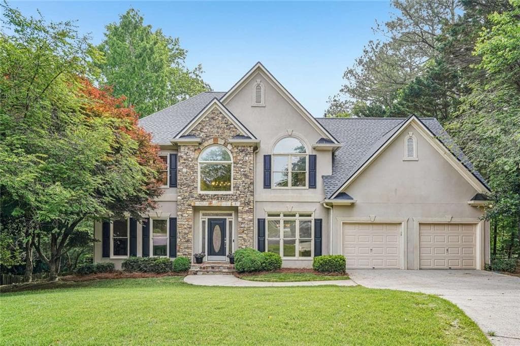 6 bedroom, 5 bathroom, 5,110 sq ft single family residence for sale at 802 Eastside Pointe, Woodstock, GA 30189