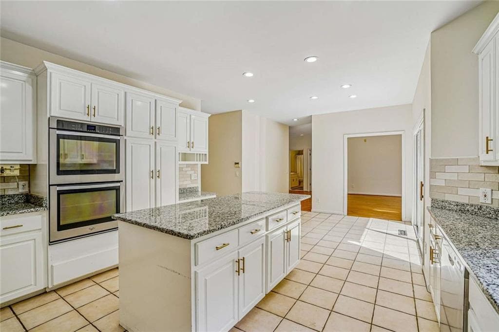6 bedroom, 5 bathroom, 5,110 sq ft single family residence for sale at 802 Eastside Pointe, Woodstock, GA 30189 — photo 6