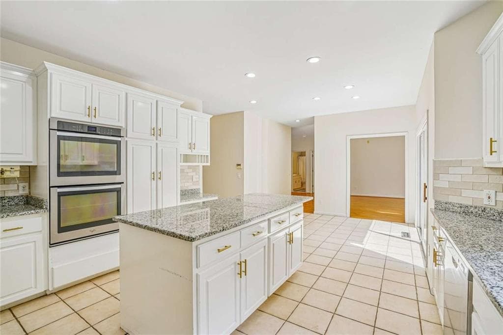 6 bedroom, 5 bathroom, 5,110 sq ft single family residence for sale at 802 Eastside Pointe, Woodstock, GA 30189 — photo 7