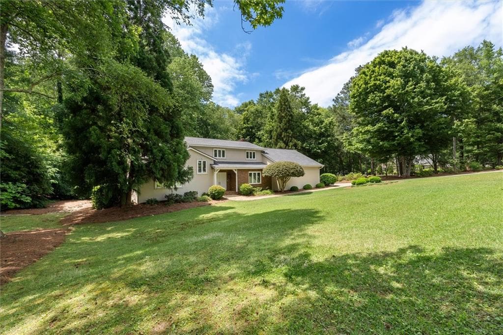 4 bedroom, 3 bathroom, 3,476 sq ft single family residence for sale at 136 S Ole Hickory Trail, Carrollton, GA 30117 — photo 3