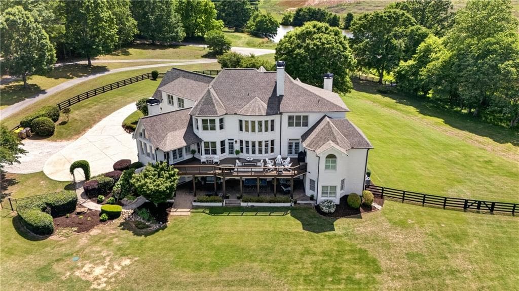 6 bedroom, 6 bathroom, 7,855 sq ft single family residence for sale at 1123 Dee Kennedy Road, Auburn, GA 30011 — photo 2