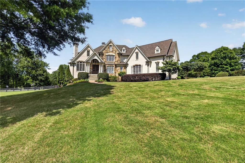 6 bedroom, 6 bathroom, 7,855 sq ft single family residence for sale at 1123 Dee Kennedy Road, Auburn, GA 30011