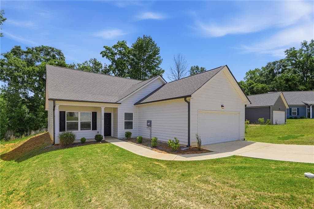 4 bedroom, 2 bathroom, 1,624 sq ft single family residence for sale at 119 Culver Street, Jackson, GA 30233 — photo 2