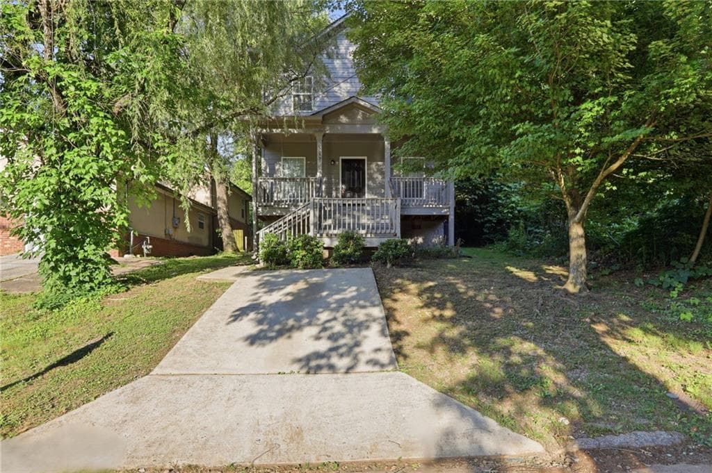 4 bedroom, 3 bathroom, 1,540 sq ft single family residence for sale at 1749 Givens Street, Atlanta, GA 30318 — photo 1 of 30