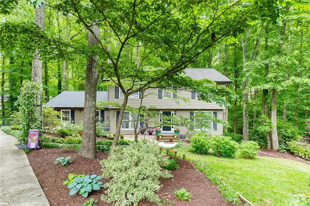 4 bedroom, 4 bathroom, 3,345 sq ft single family residence for sale at 3672 Stonelake Court, Lilburn, GA 30047