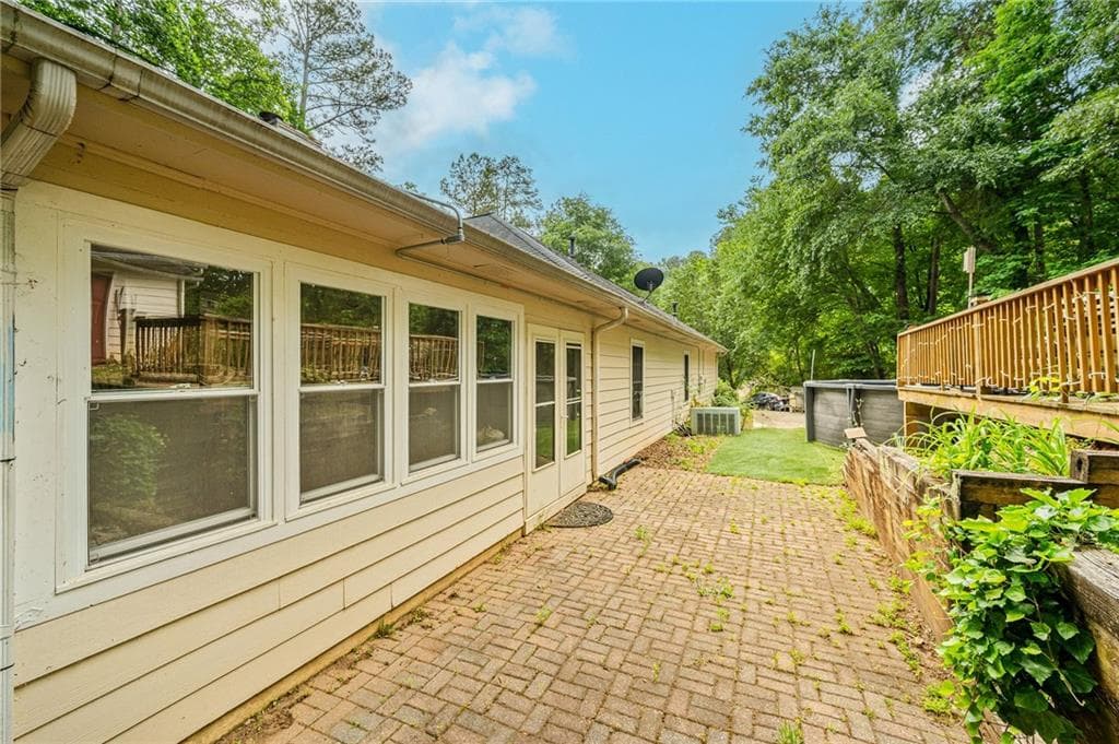 4 bedroom, 2 bathroom, 2,458 sq ft single family residence for sale at 2920 Ridge Court, Cumming, GA 30041 — photo 4