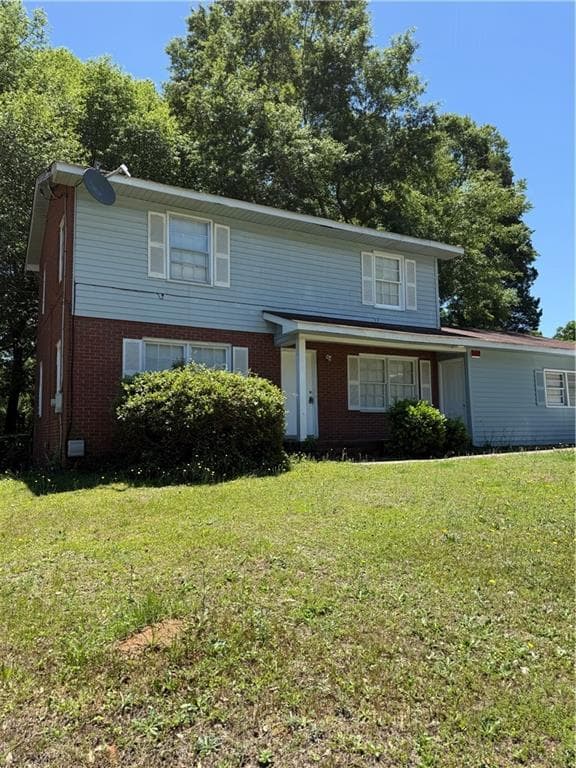 4 bedroom, 2 bathroom, 1,715 sq ft single family residence for sale at 2120 Milano Drive, Columbus, GA 31903 — photo 2