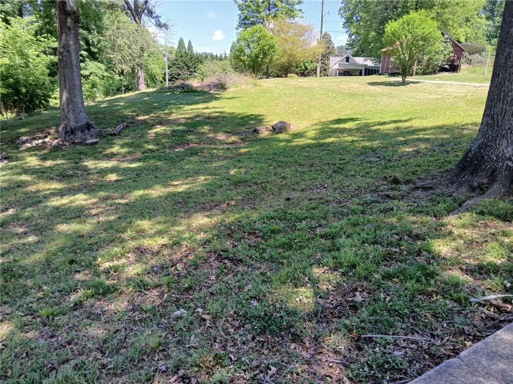 4 bedroom, 3 bathroom single family residence for sale at 3873 Paul Samuel Road, Kennesaw, GA 30152 — photo 5