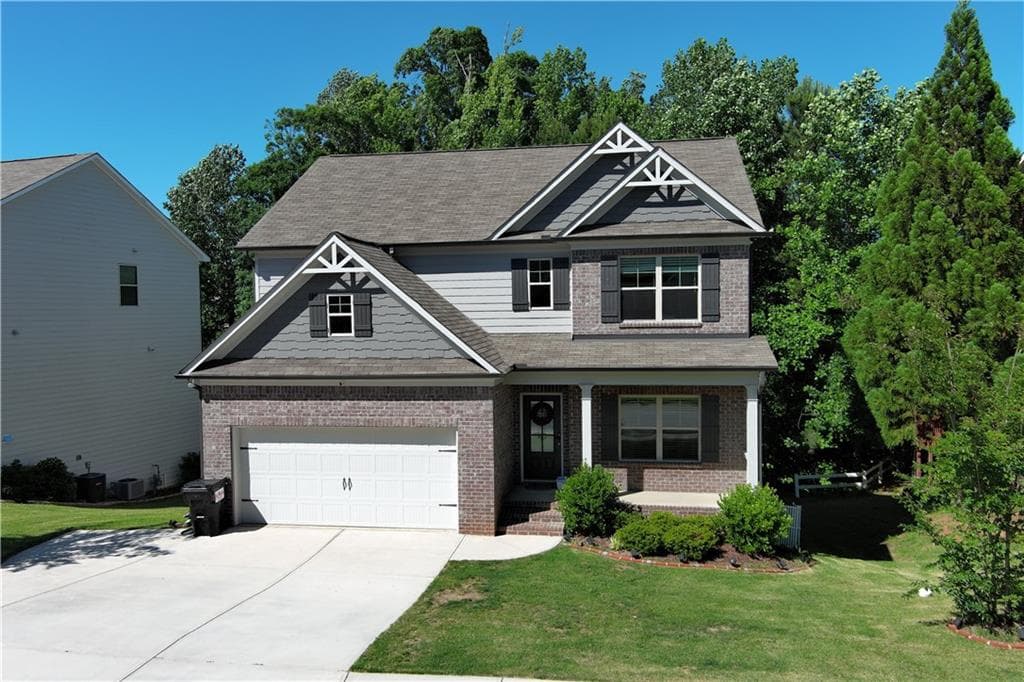 4 bedroom, 3 bathroom, 2,327 sq ft single family residence for sale at 6015 Riverwood Drive, Braselton, GA 30517 — photo 2