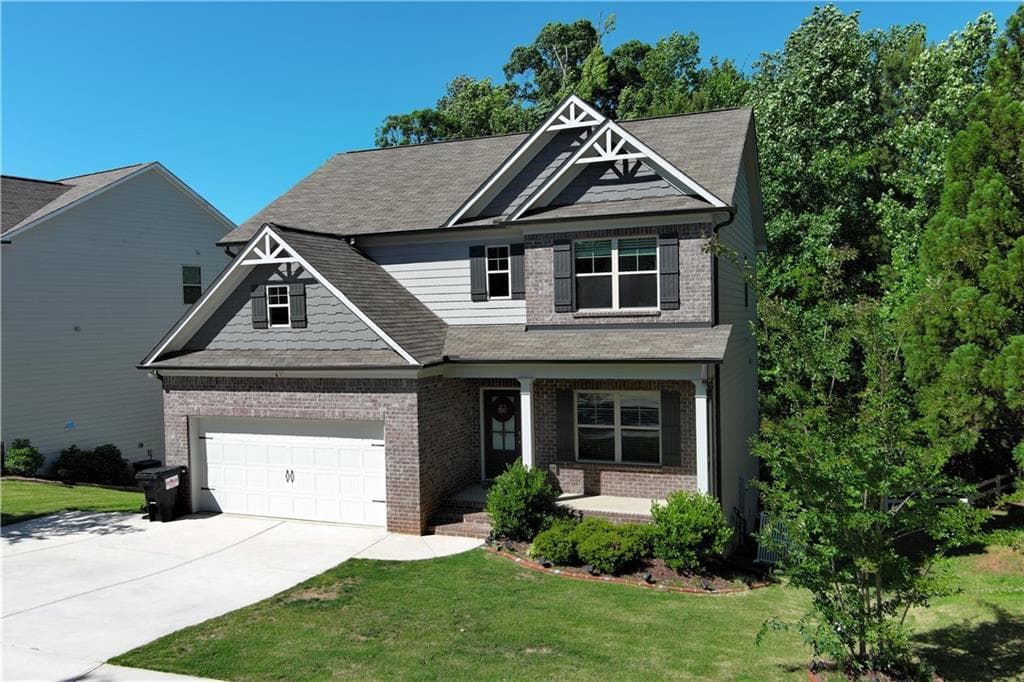 4 bedroom, 3 bathroom, 2,327 sq ft single family residence for sale at 6015 Riverwood Drive, Braselton, GA 30517 — photo 3