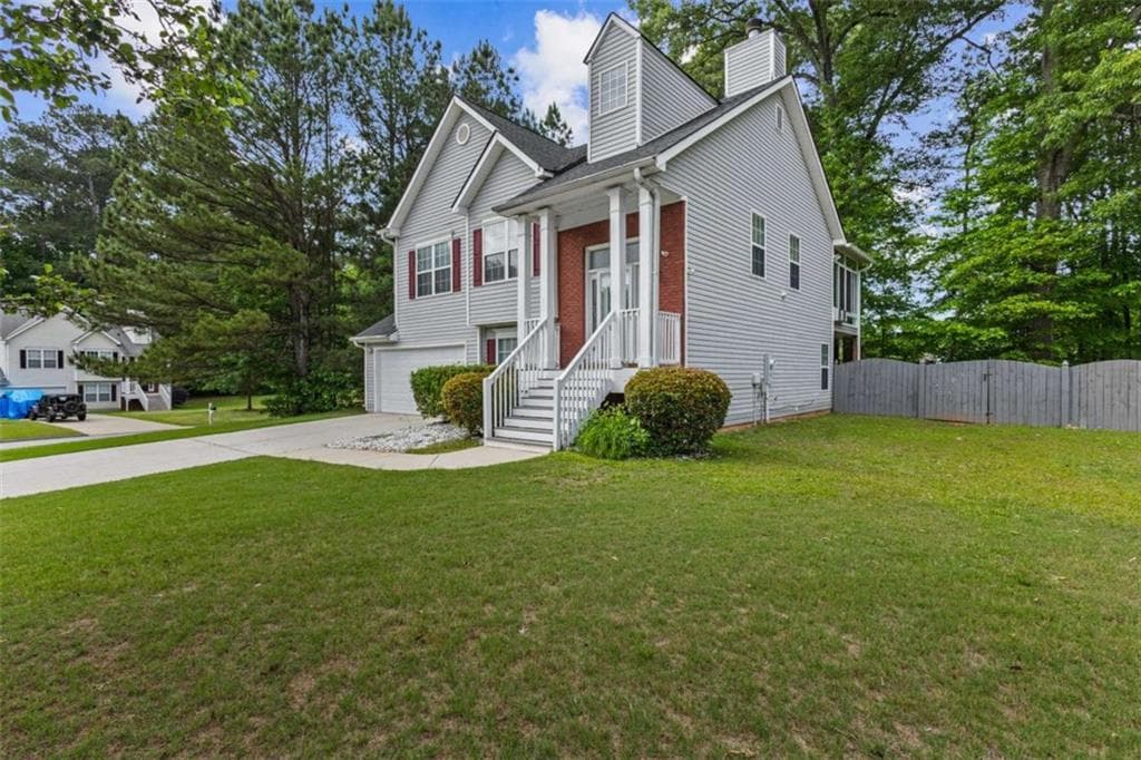 4 bedroom, 2 bathroom, 1,680 sq ft single family residence for sale at 3070 Harvest Circle, Fairburn, GA 30213 — photo 2