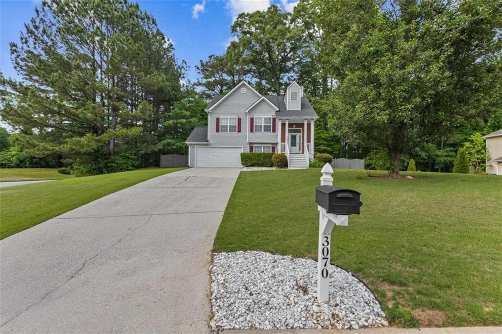 4 bedroom, 2 bathroom, 1,680 sq ft single family residence for sale at 3070 Harvest Circle, Fairburn, GA 30213 — photo 3