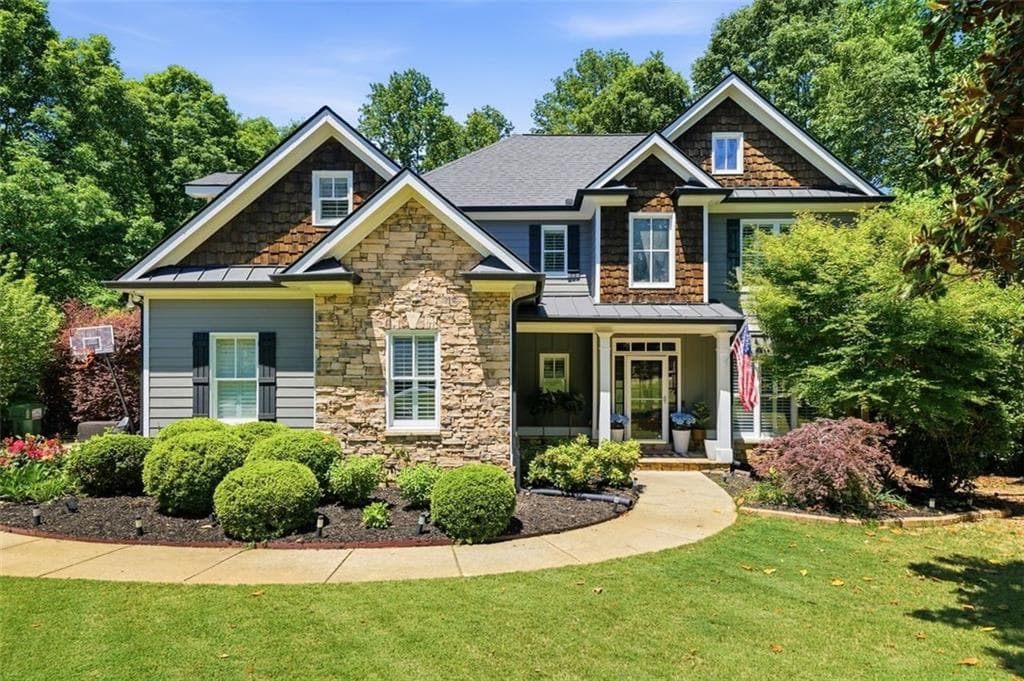 4 bedroom, 5 bathroom, 4,276 sq ft single family residence sold at 124 Carney Drive, Ball Ground, GA 30107