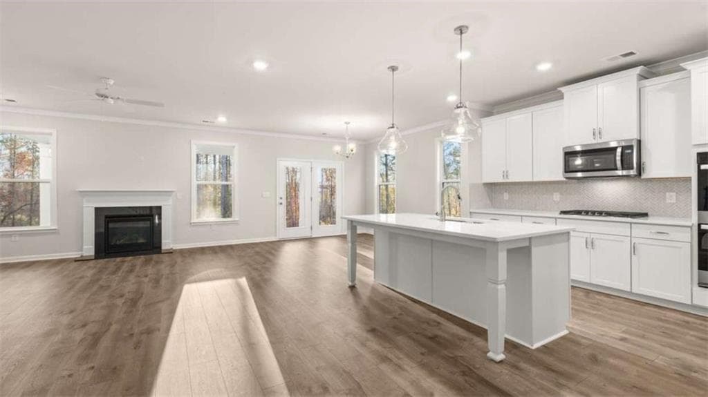 4 bedroom, 3 bathroom single family residence for sale at 1040 Trident Maple Chase, Lawrenceville, GA 30045 — photo 4