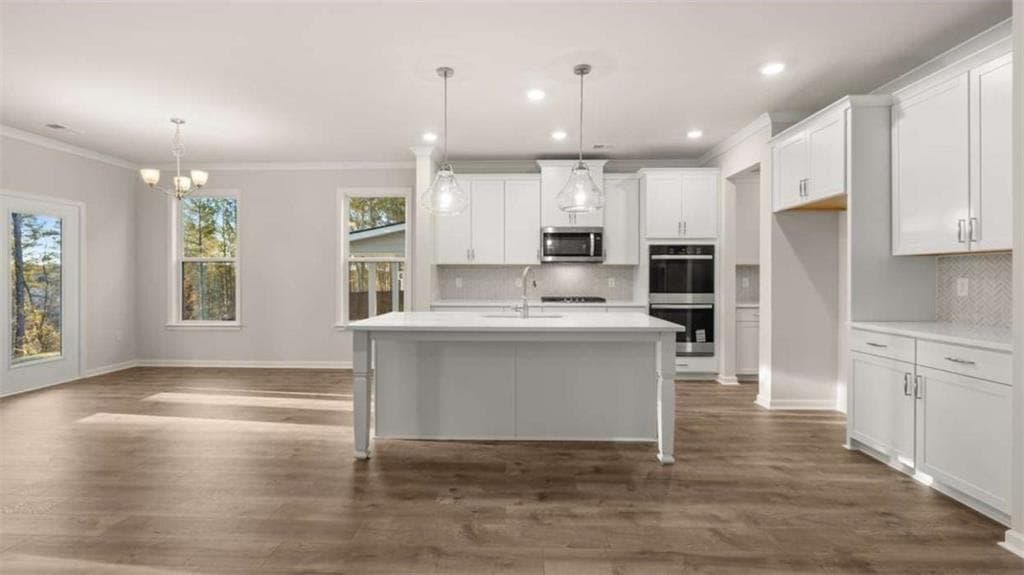 4 bedroom, 3 bathroom single family residence for sale at 1040 Trident Maple Chase, Lawrenceville, GA 30045 — photo 5