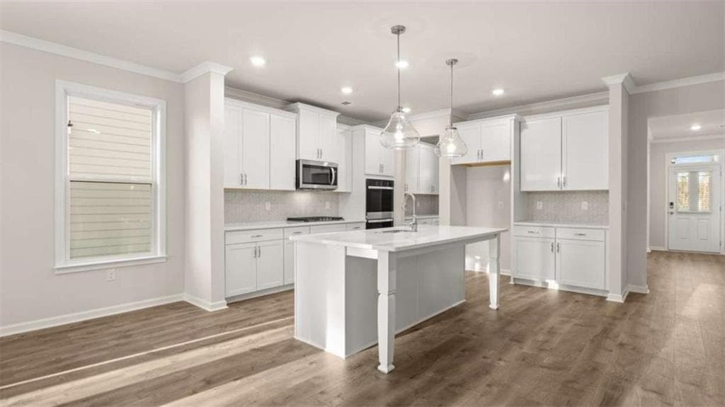 4 bedroom, 3 bathroom single family residence for sale at 1040 Trident Maple Chase, Lawrenceville, GA 30045 — photo 6