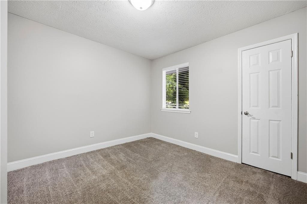 4 bedroom, 3 bathroom, 1,636 sq ft single family residence for sale at 3021 Munson Court, Snellville, GA 30039 — photo 7