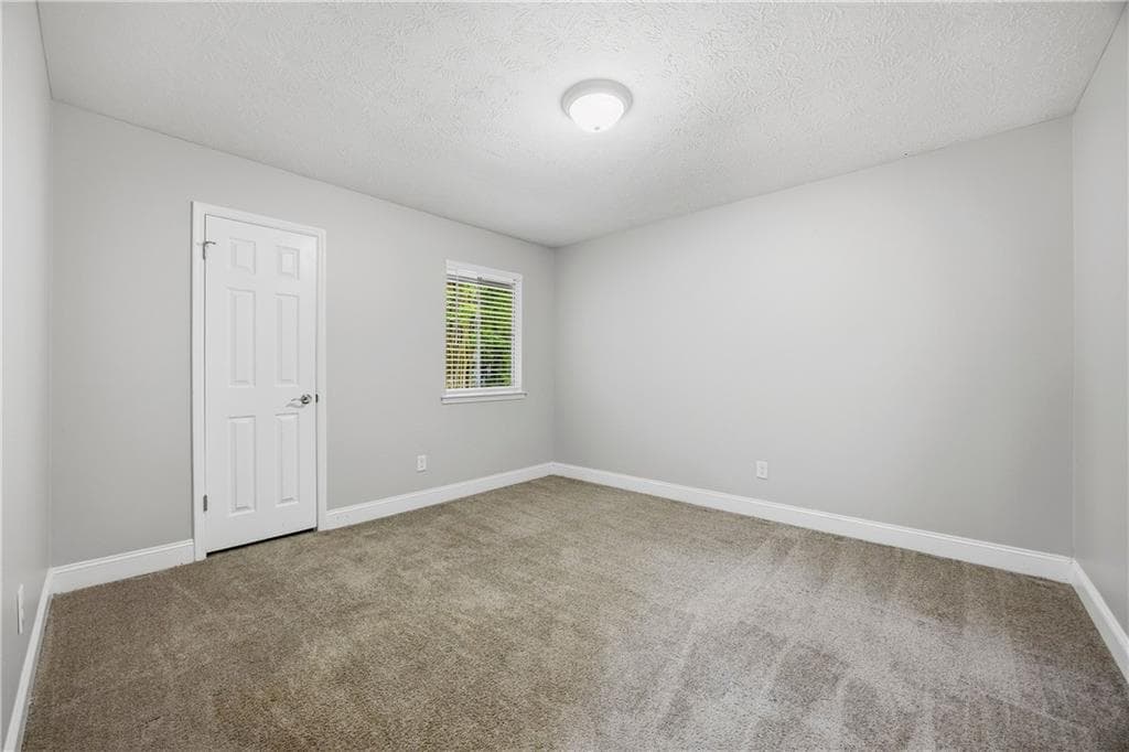 4 bedroom, 3 bathroom, 1,636 sq ft single family residence for sale at 3021 Munson Court, Snellville, GA 30039 — photo 9