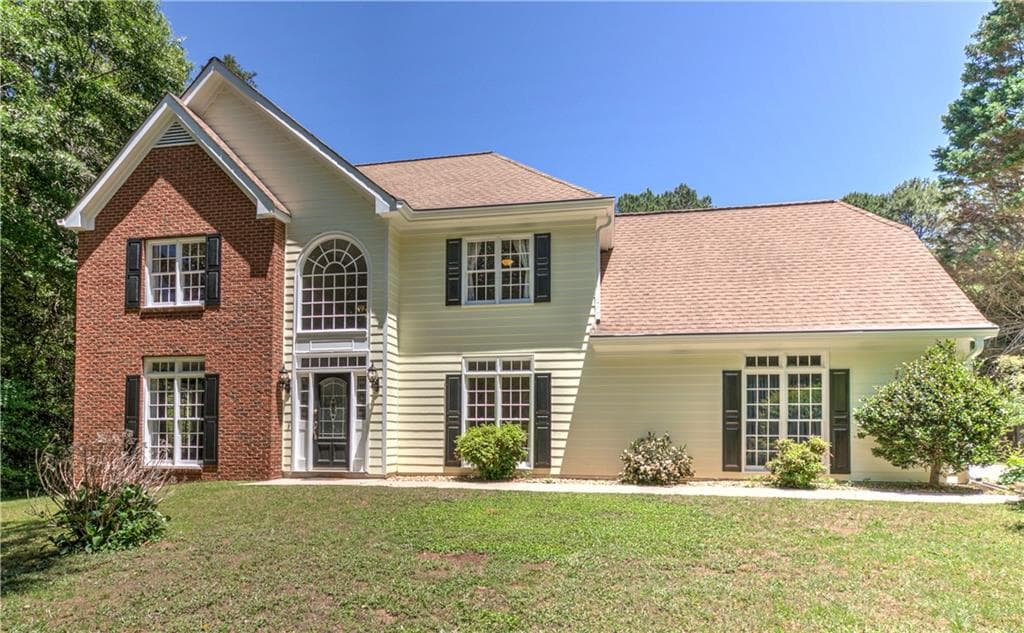 4 bedroom, 3 bathroom, 2,410 sq ft single family residence for sale at 6310 Black Oak Drive, Cumming, GA 30040 — photo 1 of 56