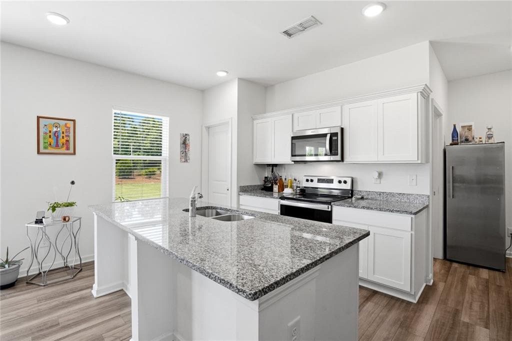 4 bedroom, 3 bathroom, 2,132 sq ft single family residence for sale at 65 Knightsbridge Lane, Winder, GA 30680 — photo 6