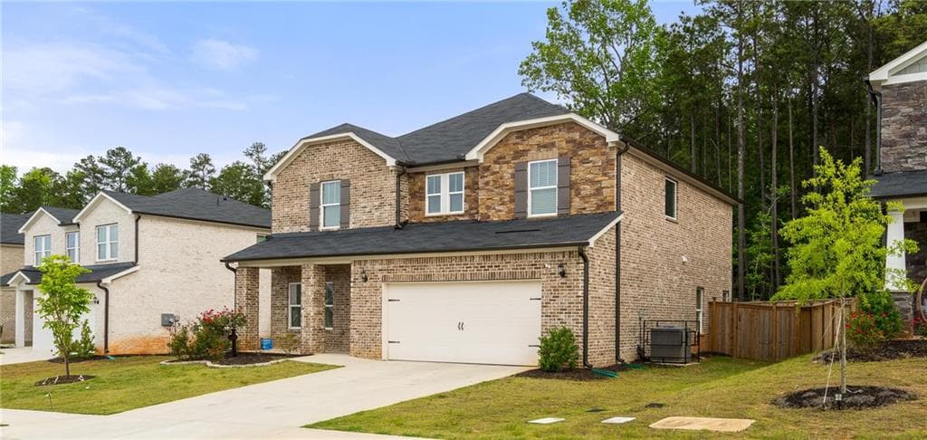 4 bedroom, 3 bathroom, 2,479 sq ft single family residence for sale at 7767 Richmond Trail, Fairburn, GA 30213 — photo 2