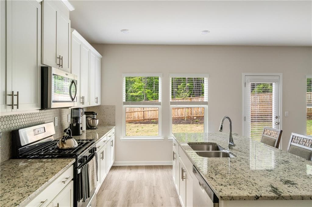 4 bedroom, 3 bathroom, 2,479 sq ft single family residence for sale at 7767 Richmond Trail, Fairburn, GA 30213 — photo 8
