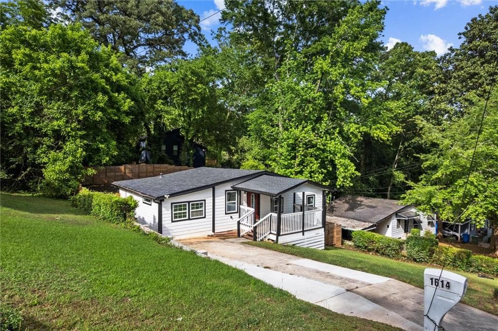 4 bedroom, 2 bathroom, 1,500 sq ft single family residence for sale at 1614 Abner Terrace, Atlanta, GA 30318 — photo 4