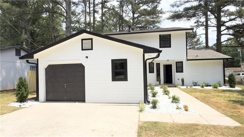 3 bedroom, 2 bathroom, 1,408 sq ft single family residence for sale at 2070 Mallard Way, Lithonia, GA 30058 — photo 1 of 27