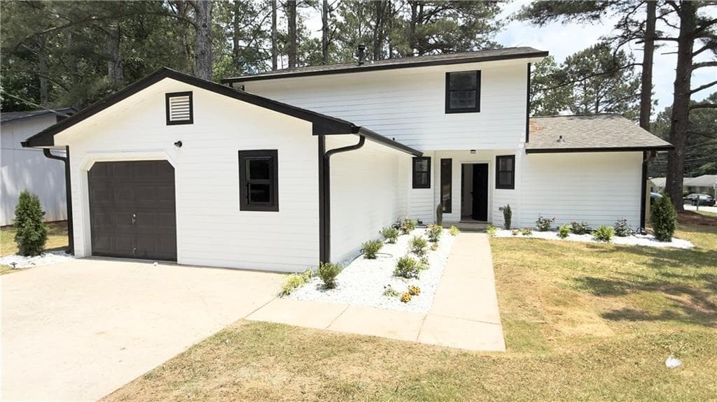 3 bedroom, 2 bathroom, 1,408 sq ft single family residence for sale at 2070 Mallard Way, Lithonia, GA 30058 — photo 2