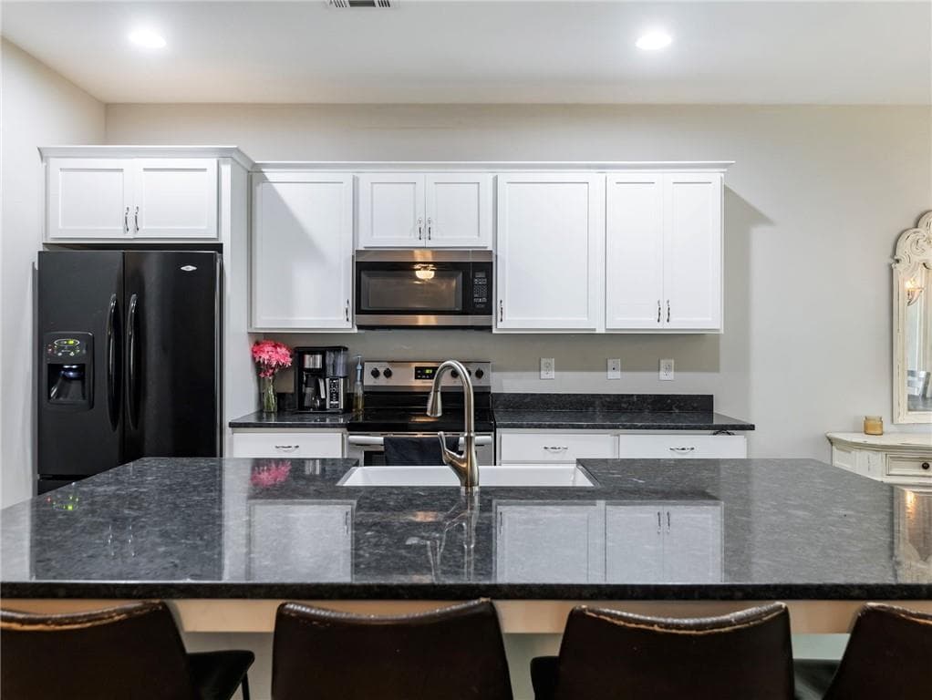 4 bedroom, 3 bathroom, 2,255 sq ft single family residence for sale at 6357 Woodland Station Drive, Lula, GA 30554 — photo 8