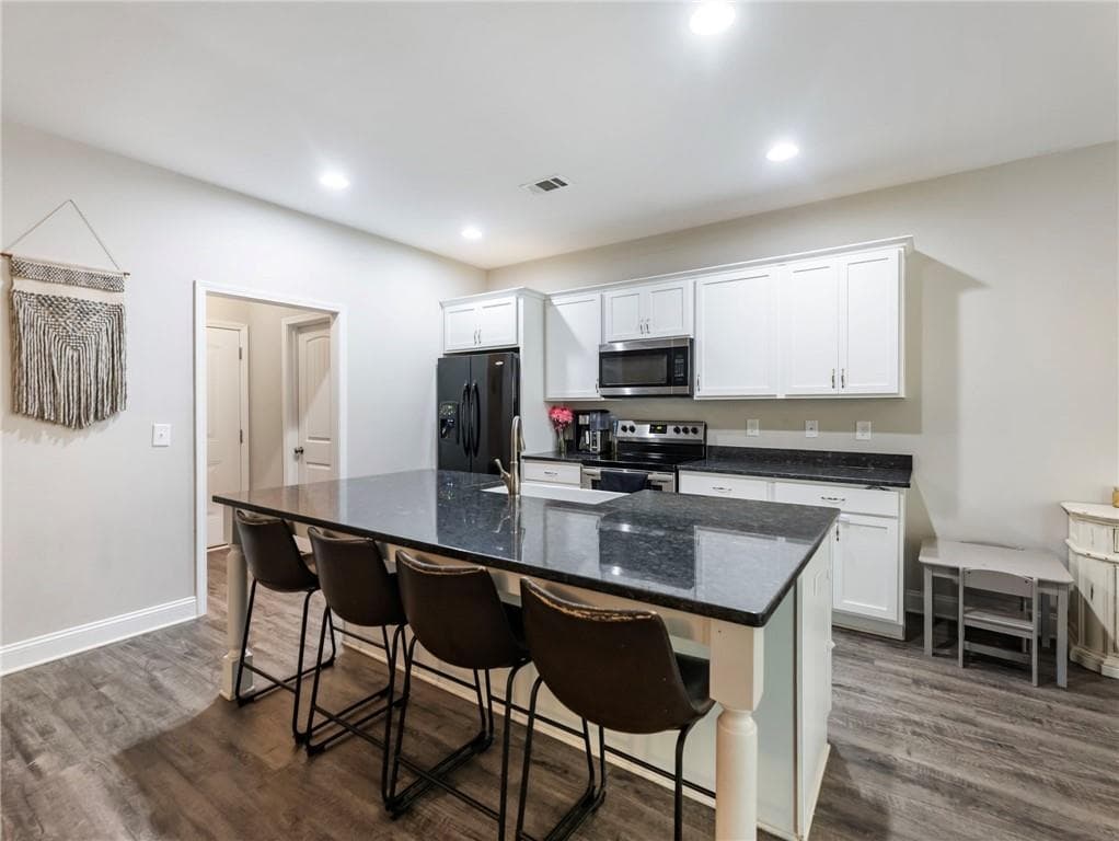 4 bedroom, 3 bathroom, 2,255 sq ft single family residence for sale at 6357 Woodland Station Drive, Lula, GA 30554 — photo 9
