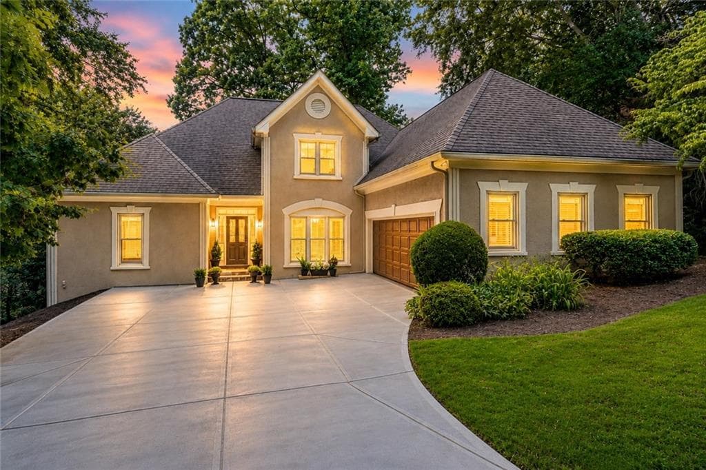 6 bedroom, 5 bathroom, 4,930 sq ft single family residence for sale at 5640 Sandown Way, Johns Creek, GA 30097 — photo 1 of 70
