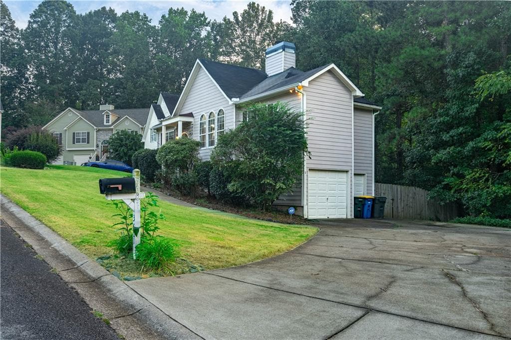 4 bedroom, 3 bathroom, 2,177 sq ft single family residence for sale at 3601 Anna Lane, Kennesaw, GA 30144 — photo 2