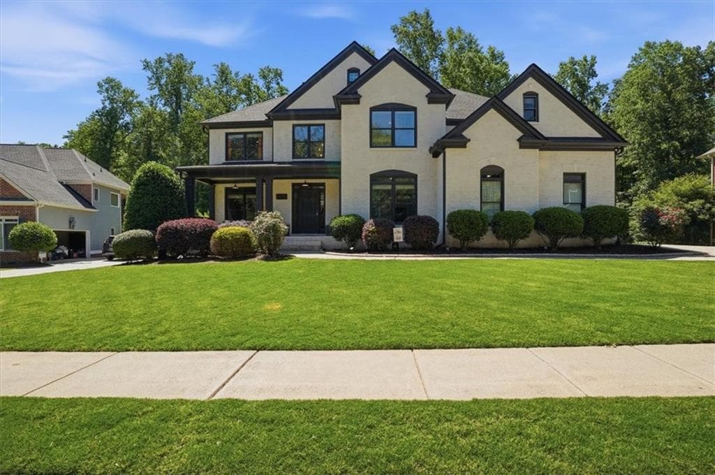 5 bedroom, 5 bathroom, 6,300 sq ft single family residence for sale at 6670 Bridge Brook Ovlk, Cumming, GA 30028 — photo 2