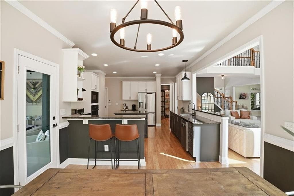 5 bedroom, 5 bathroom, 6,300 sq ft single family residence for sale at 6670 Bridge Brook Ovlk, Cumming, GA 30028 — photo 9