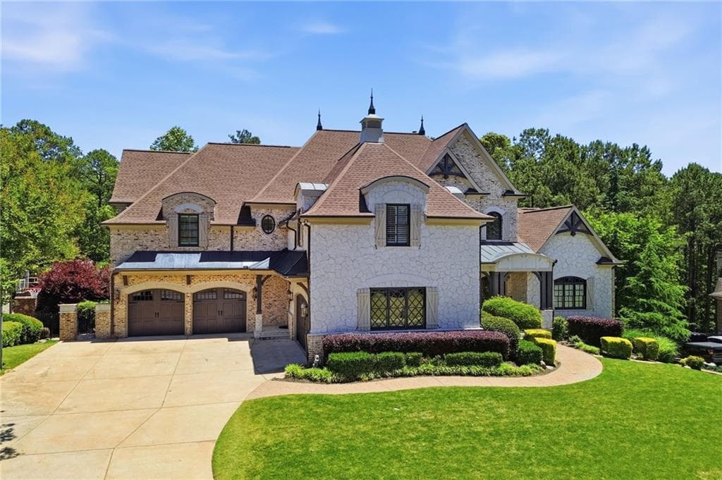 7 bedroom, 9 bathroom, 8,896 sq ft single family residence sold at 521 Gold Shore Lane, Canton, GA 30114