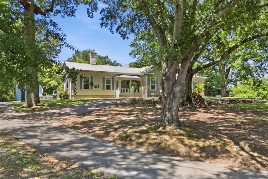 5 bedroom, 4 bathroom, 4,309 sq ft single family residence for sale at 703 Forrest Avenue, Rockmart, GA 30153 — photo 3