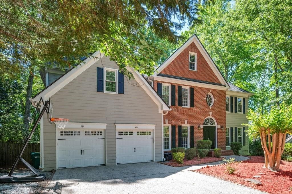 5 bedroom, 4 bathroom, 4,122 sq ft single family residence sold at 115 Ashewoode Downs Lane, Johns Creek, GA 30005