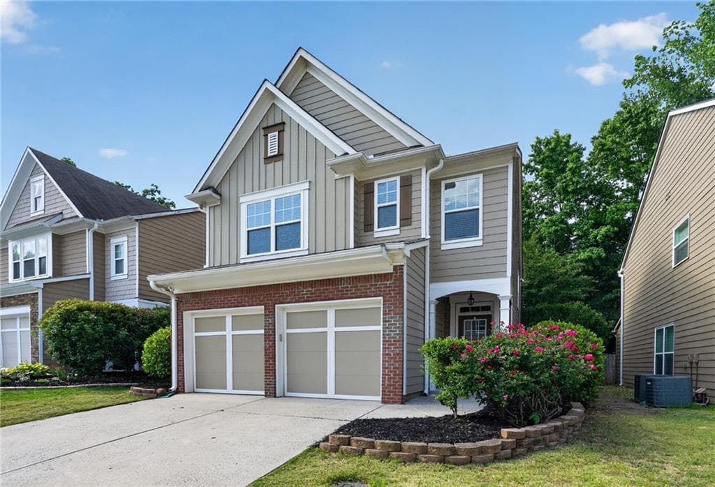 4 bedroom, 3 bathroom, 1,956 sq ft single family residence for sale at 5750 Crestwick Way, Cumming, GA 30040 — photo 2