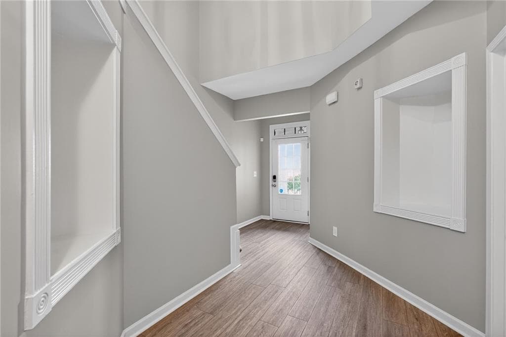 4 bedroom, 3 bathroom, 1,956 sq ft single family residence for sale at 5750 Crestwick Way, Cumming, GA 30040 — photo 3
