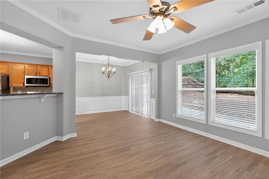 4 bedroom, 3 bathroom, 1,956 sq ft single family residence for sale at 5750 Crestwick Way, Cumming, GA 30040 — photo 6