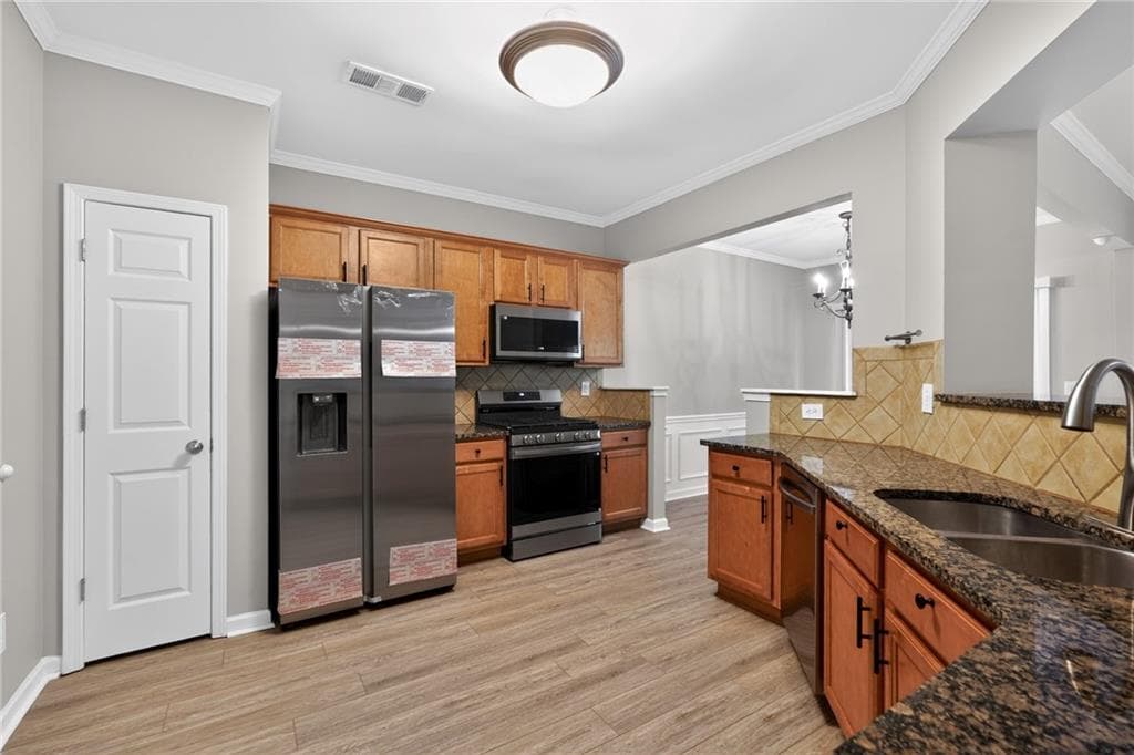 4 bedroom, 3 bathroom, 1,956 sq ft single family residence for sale at 5750 Crestwick Way, Cumming, GA 30040 — photo 9