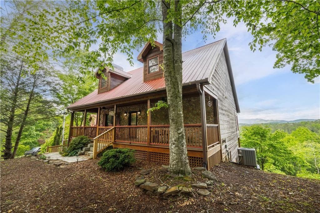 3 bedroom, 2 bathroom, 2,775 sq ft single family residence for sale at 170 Wildwood Court, Ellijay, GA 30540 — photo 2
