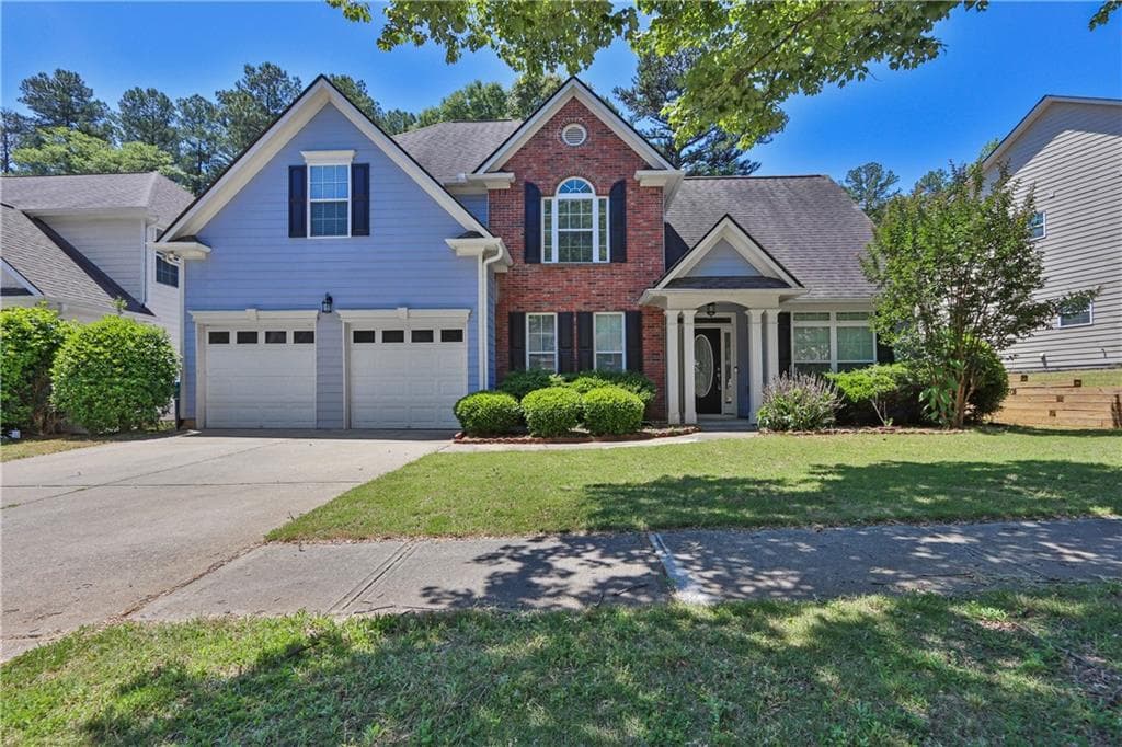 5 bedroom, 3 bathroom, 2,339 sq ft single family residence for sale at 1185 Martins Down Drive, Lawrenceville, GA 30045